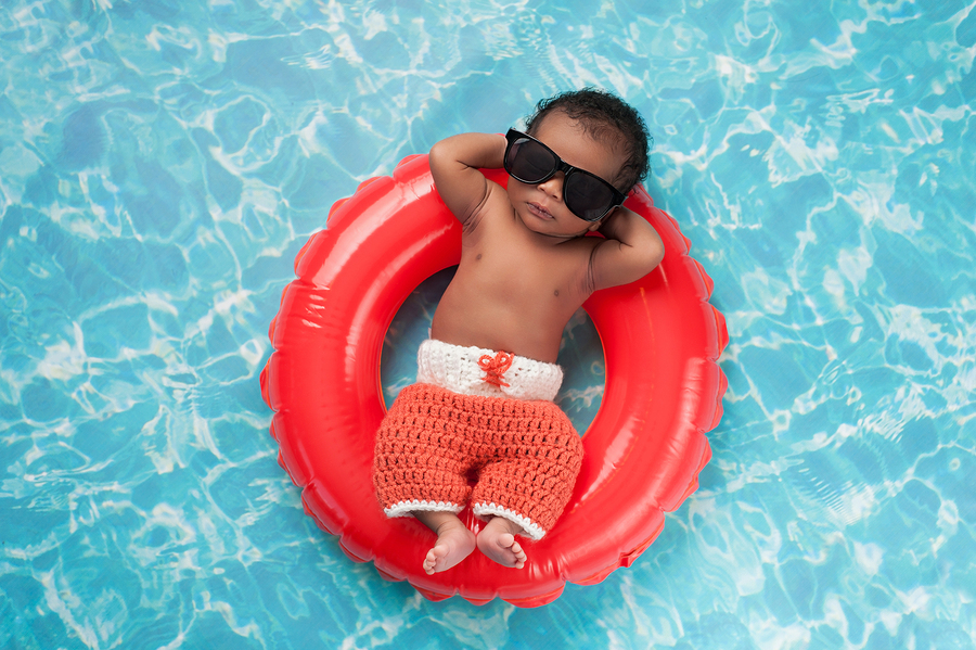 bigstock-Newborn-Baby-Boy-Floating-On-A-114143243-1.jpg