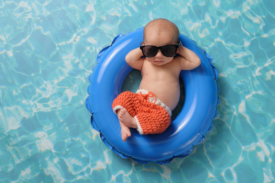 bigstock-Newborn-Baby-Boy-Floating-On-A-120546728-1.jpg
